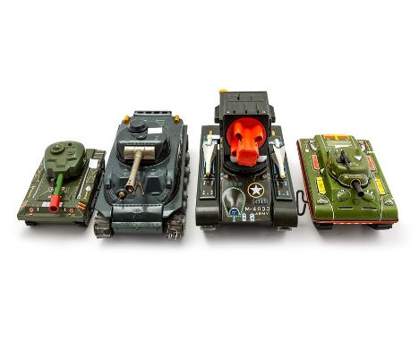 Tinplate: A collection of battery operated army tanks by Masudaya, Yonezawa and Nomura together with a Marx clockwork tank. (