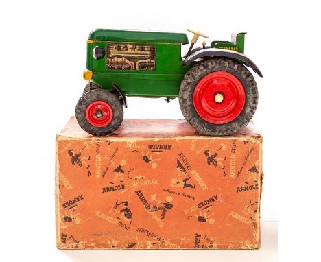 Arnold: A boxed tinplate Arnold Electric Driven Tractor, 7300, Made in Western Germany, as found.