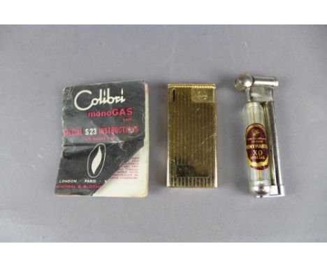 Calibra lighter and Remy Martin lighter