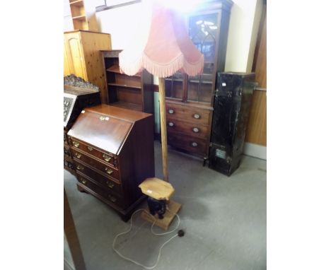 Standard lamp with attached elephant table