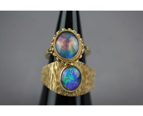 2 Large opal 9ct rings ( 13grams )