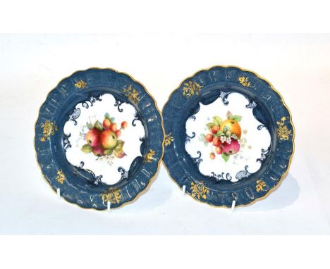 A pair of Royal Worcester fruit painted plates, signed E.Phillips, 21.5cm diameter . Some mild wear to the gilded edges and s
