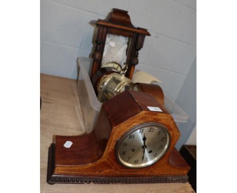 A selection of clocks including a Vienna type wall clock, two mantel clocks, Comitts of London mantel clock and three mantel 