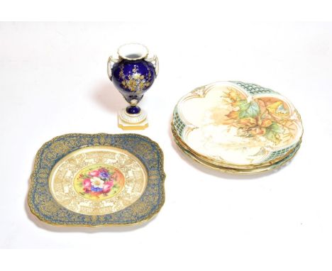 A Royal Worcester floral painted gilt-highlight plate, signed E.Barker (a.f.); together with three Royal Worcester blush ivor