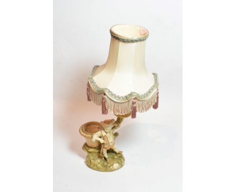 A Royal Worcester blush ivory figural candlestick, model number 1365, with puce painted marks and impressed marks, 21cm exclu