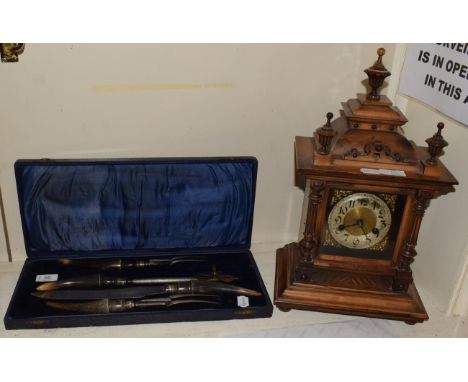 A walnut striking mantel clock with German movement; together with a horn handled carving set (a.f.), an Alfred Meakin tea se