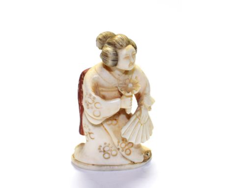 A Meiji period ivory netsuke in the form of a Geisha 