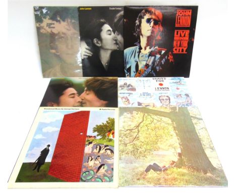 POP MEMORABILIA - THE BEATLES  Twelve assorted books; together with seven solo-project long-playing records by John Lennon (6