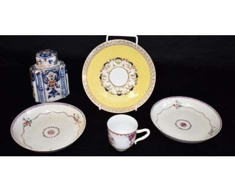 A FAIENCE TEA CADDY WITH LID  12cm high, two New Hall dishes and a tea cup, and a Continental yellow ground plate with gilt d