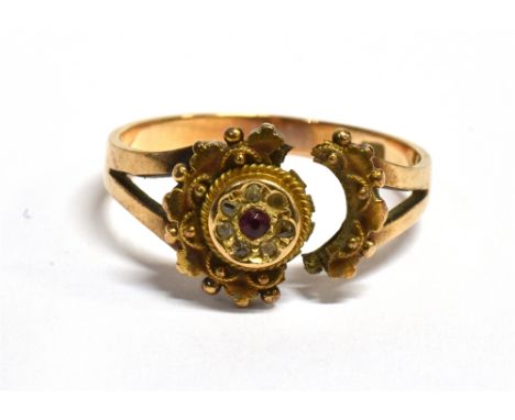 A VICTORIAN 15CT GOLD CLUSTER RING A/F the target style cluster set with a tiny ruby and tiny diamond with etruscan style sur