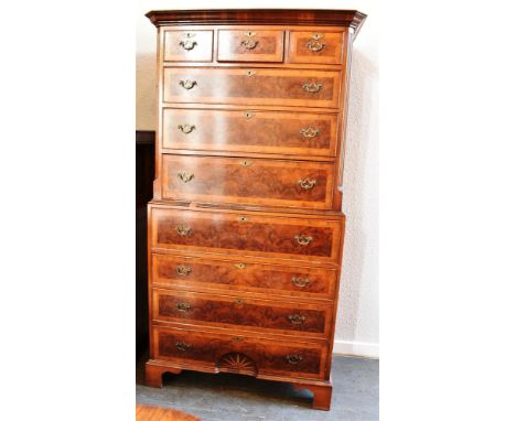 20TH CENTURY SECRETAIRE CHEST ON CHEST, the upper section with a moulded cornice above three short drawers, and three graduat