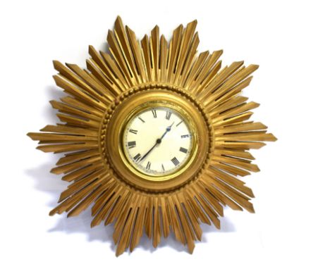 A GILT SUNBURST WALL CLOCK with Abec mechanical movement, 35cm diameter Condition Report : currently ticking, carved wooden f