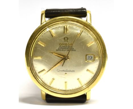 A GENT'S OMEGA CONSTELLATION GOLD PLATED WATCH the automatic movement with sweep second hand and date window, Omega symbol to