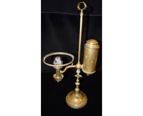 AN EDWARDIAN BRASS RISE AND FALL ADJUSTABLE STUDENTS LAMP  55cm high overall Condition Report : brass worn and pitted, but lo