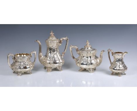 A Victorian cast silver four piece tea service, Charles Reily &amp; George Storer, London 1851, comprising of teapot, hot wat
