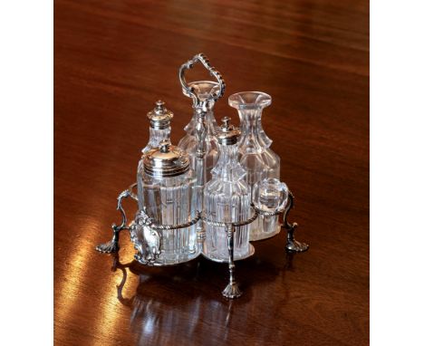 A George III silver cruet stand, Jabez Daniell &amp; James Mince, London 1766, the cinquefoil stand with seven gadrooned bott