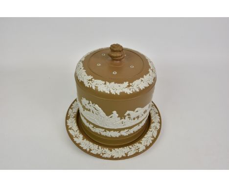 A Victorian brown stoneware Stilton dish and cover, with applied white hunting scene and bands of oak leaf decoration in the 