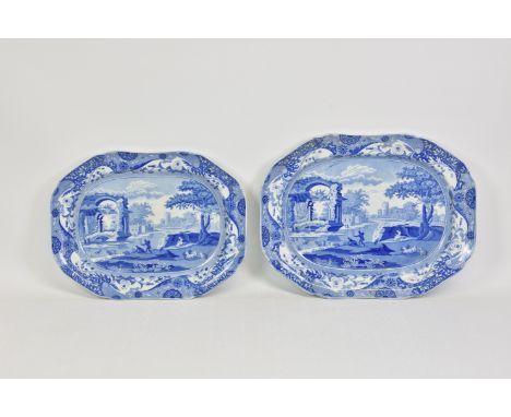 Two blue and white Spode shaped rectangular meat platters, each with a scene of figures in a rural landscape and ruins by a r