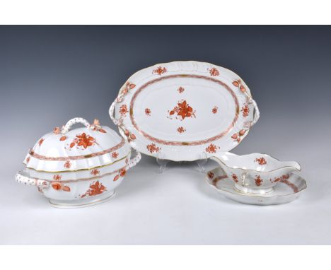 A collection of Herend porcelain Orange Apponyi 'Chinese bouquet' dinnerware, each piece decorated with orange floral sprays 