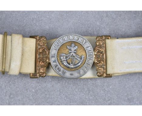 A rare 3rd Battalion Royal Guernsey Militia belt buckle, two piece interlocking buckle, each section with scrolling belt inse