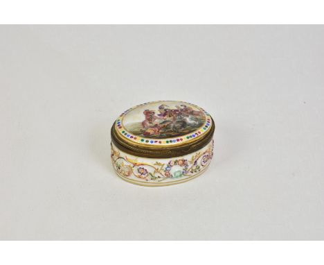 An oval Capodimonte porcelain lidded pot / snuff box, the side with raised floral decoration and the lid with a horseback bat