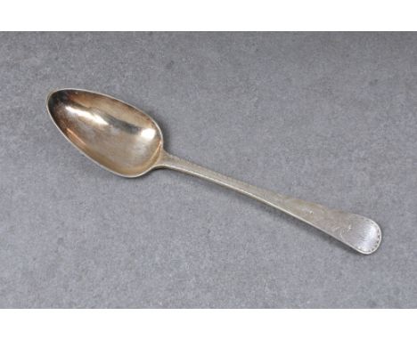 A Channel Islands silver bright cut Old English pattern table spoon, maker's mark T.DG J.LG struck once (Thomas de Gruchy and