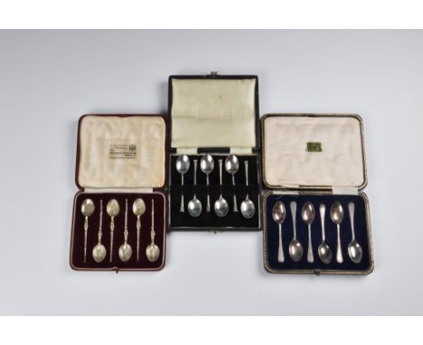 A cased set of six silver gilt apostle spoons, Goldsmiths &amp; Silversmiths Co Ltd, London, 1936, 3¾in. (9.7cm.) long, toget