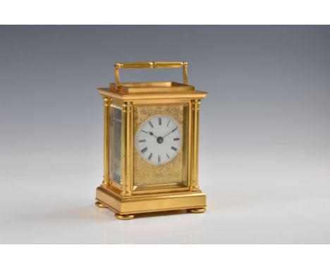 A fine English gilt brass double fusee carriage clock with hour strike, mid-19th century, unsigned, the slightly convex, 6.5c