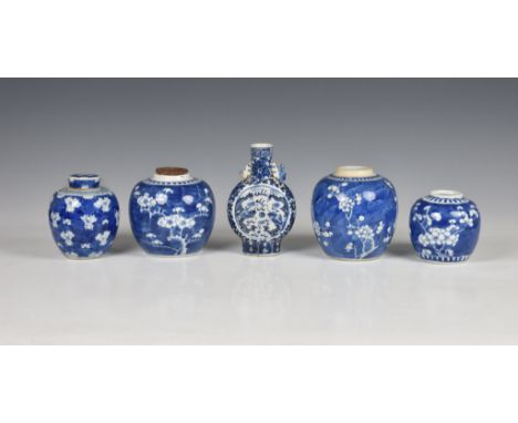 Four Chinese blue and white prunus blossom ginger jars, 20th century, three with dentil band to the rim, the fourth with toot