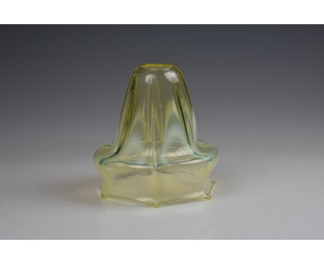 A Victorian vaseline glass Art Nouveau style lamp shade, of sinuous, bell flower outline, designed for a desk lamp or pendant