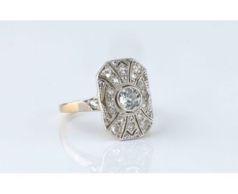 An antique 14ct white gold, platinum and diamond plaque ring, 1920s-30s, hallmarked '585', the octagonal plaque set with a ce