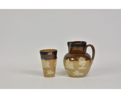 A Doulton Lambeth ale jug and beaker, with applied figural, hunting and drinking scenes and silver top rim mounts by Corneliu