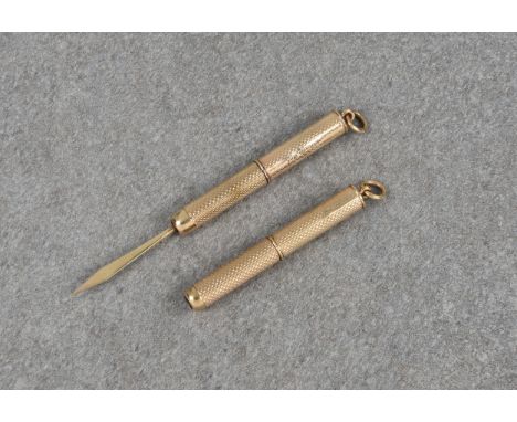 A closely matched pair of 9ct gold propelling toothpicks, one by Villiers &amp; Jackson, Birm. 1965; the other S J Rose &amp;