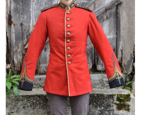 A 3rd Royal Guernsey Light Infantry scarlet jacket, navy blue collar with leopards passant to either side the outer edges fin