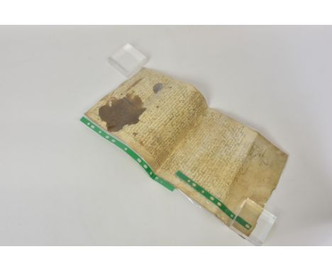 An early 16th century French manuscript, written in Latin on vellum, dated and inscribed to the top margin "1502. 7 aoust. no