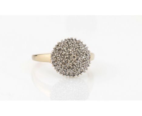 A 9ct yellow gold and diamond cluster ring, the domed, circular head set with six tiers of small single cut diamonds, total 0