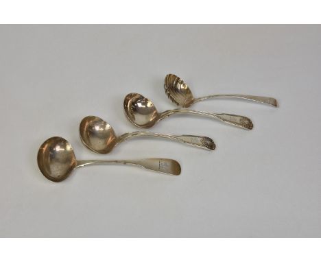 An Irish silver fiddle pattern sauce ladle, James Scott, Dublin 1818, rat tail to bowl, engraved rearing lion to terminal, 7i
