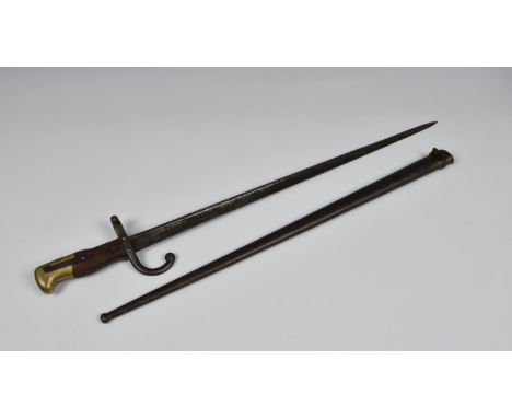 A French M1874 Gras sword bayonet, 20 1/2 inch, single edged, T section blade.  Steel hook quillon and muzzle ring.  Brass po