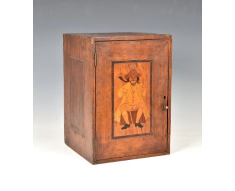 A Victorian oak inlaid marquetry smokers cabinet, of rectangular box form, the hinged front door, having inlaid marquetry pan