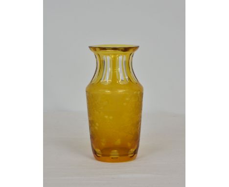 An amber cut-glass vase with flash cut flared neck, finely engraved with central cartouches, running deer and game birds, pol