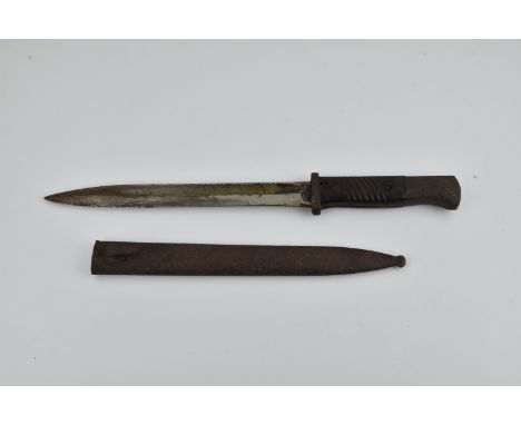 A Second War German Mauser K98 bayonet in semi-relic condition, by Carl Eickhorn, No.8555 with steel scabbard.  Rust on handl