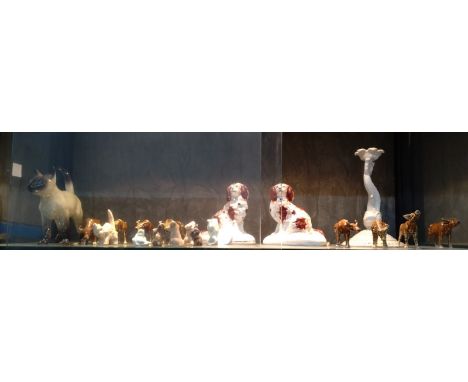 A Coopercraft Siamese cat 18cm, a Monselice Dauphinoise candlestick 20cm, miniature ceramic animals, and two Chinese dogs (in