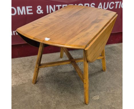 An Ercol Blonde elm Windsor drop-leaf table 