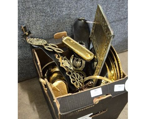 A collection of brass including two horse brasses, hall mirror, bon bon dish, planter, mirror, plate, jug and watering can. M