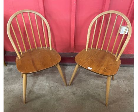 A pair of Ercol Blonde elm and beech Windsor chairs 