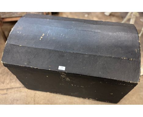 An early 20th Century black domed topped steamer trunk 