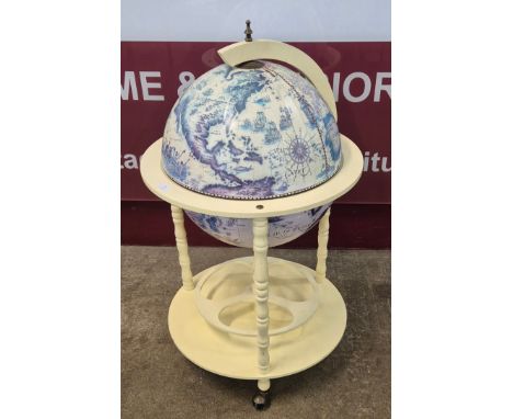 An Italian style terrestrial globe cocktail cabinet/drinks trolley 