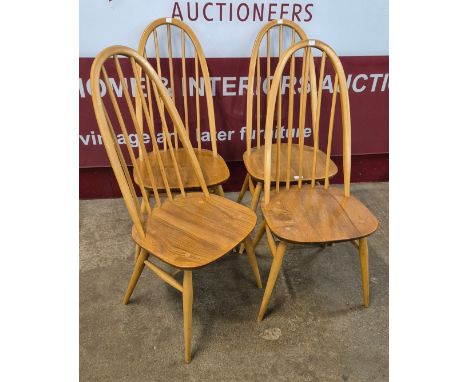 A set of four Ercol Blonde elm and beech Quaker chairs 
