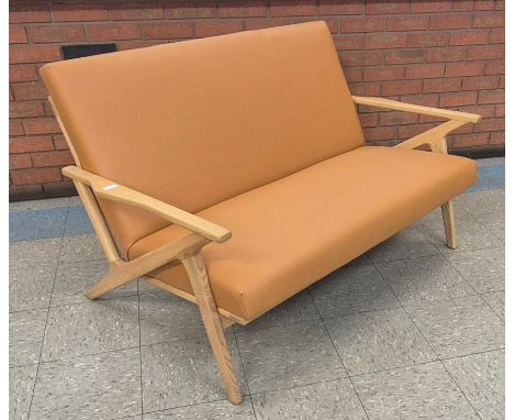 A Danish style ash and tan vinyl sofa 