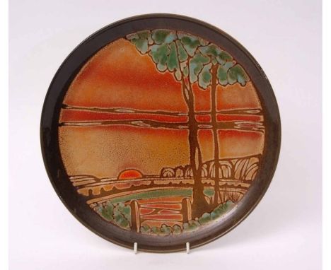 Poole Potter Aegean dish with landscape pattern, marked E H to the base, 32cms diam 